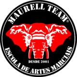 Maurell Team Escola De Artes Marciais - logo